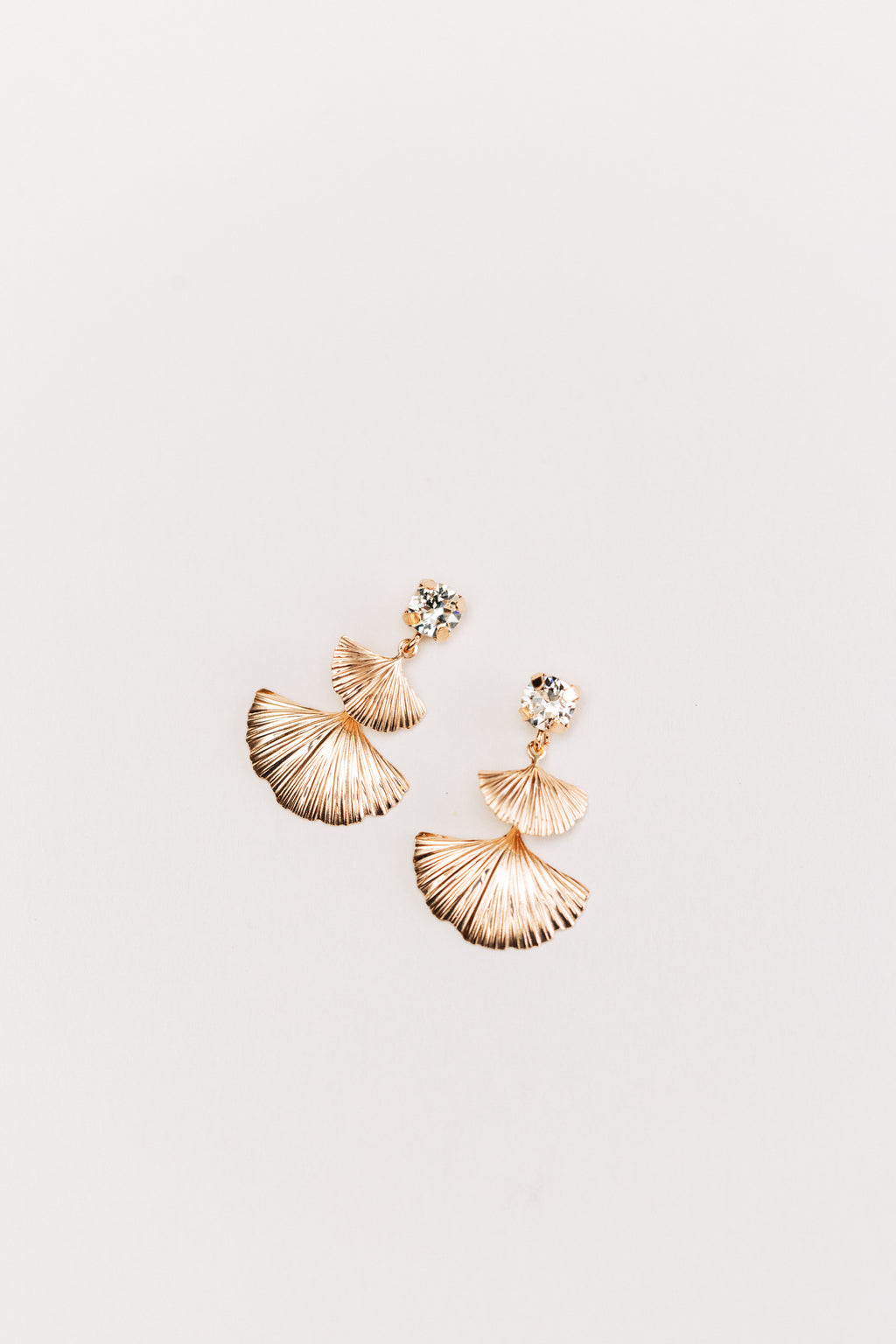 This image displays the hypoallergenic Mia earrings in rose gold, featuring an elegant design inspired by leaves. The earrings are crafted to capture the delicate texture and vibrant hue of rose gold, enhancing their sophisticated appeal.